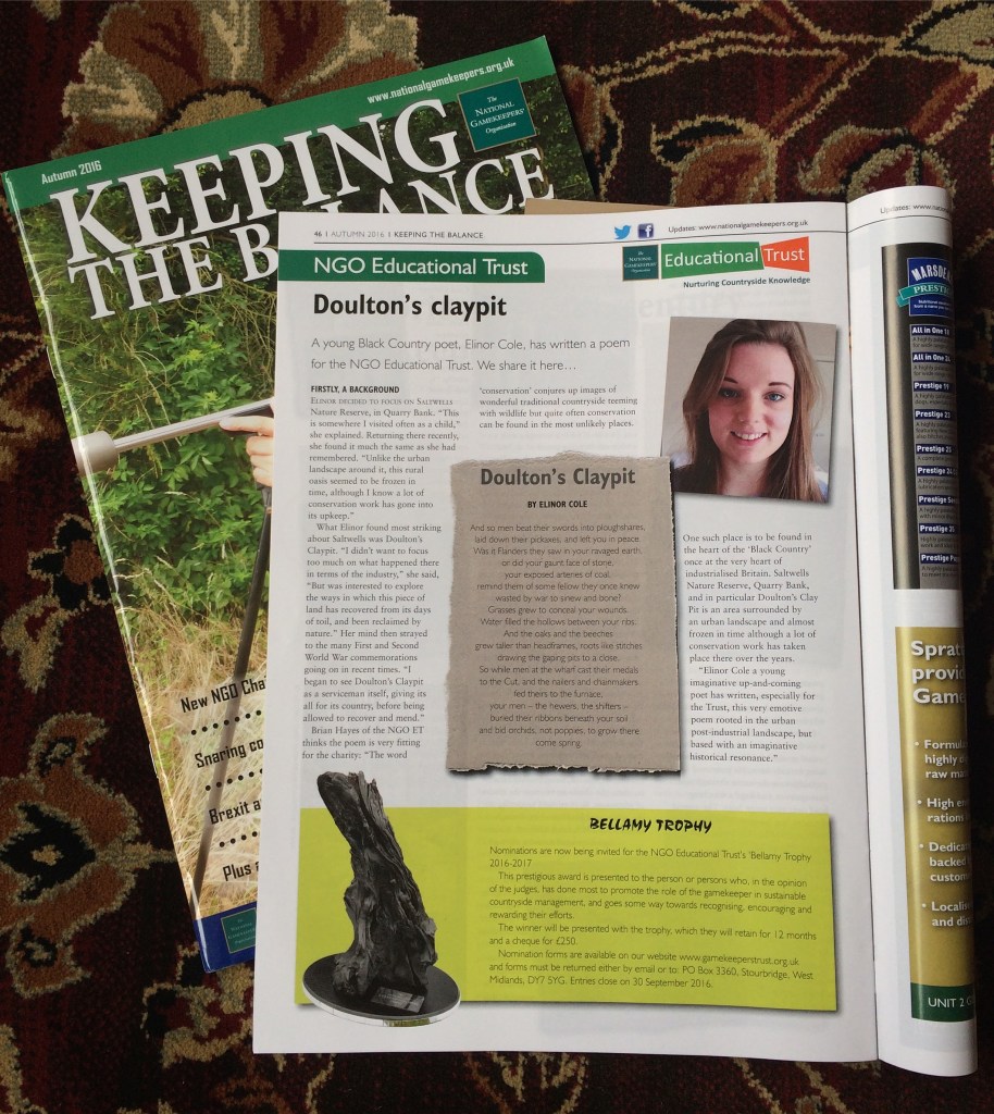 A magazine is open at a page with the title 'Doulton's Claypit'. There is an article, and inset, a panel with a poem of the same title. There is also a photograph of a young woman (Nellie) in the corner).